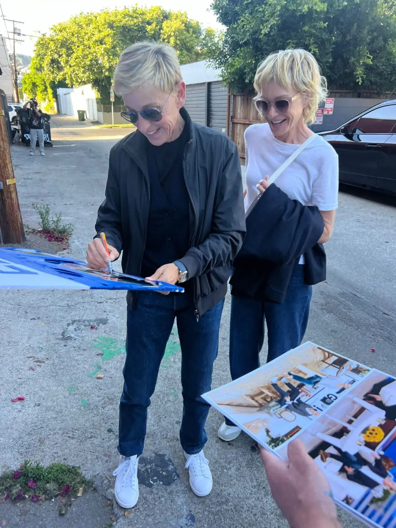 Portia de Rossi and Ellen DeGeneres at Ellen s Comedy Tour in Los Angeles